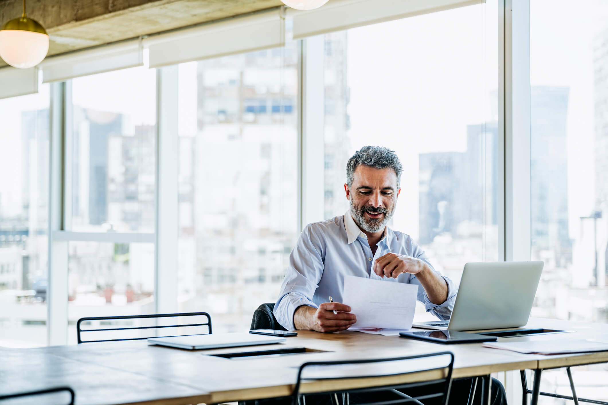 Photo of a man with laptop